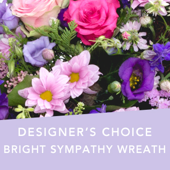 Code: D313. Name: Bright Sympathy wreath. Description: Can not decide on what to send? The Designers Choice bright Sympathy wreath is a one of a kind collection of the designers freshest flowers in a bright colour scheme. Price: NZD $99.95
