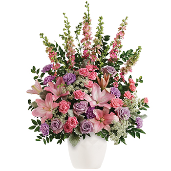 Code: S307. Name: Soft Blush. Description: Like a whisper from heaven the soft pinks and lavenders in this feminine arrangement bring peace and hope in a time of loss. Price: NZD $325.95