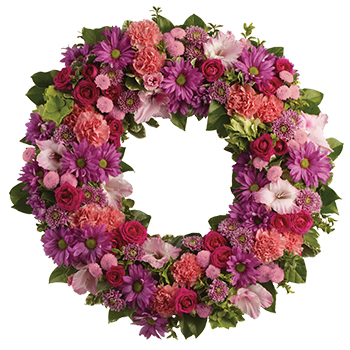 Code: S309. Name: Ringed by Love. Description: The memory of brighter days is always a comfort to those in mourning. This lovely wreath will display your compassion beautifully. Price: NZD $278.95